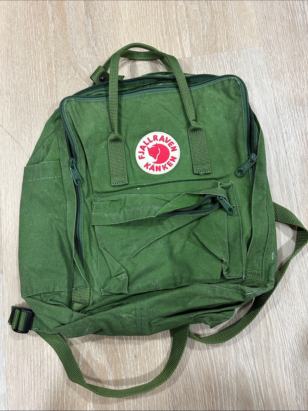 Fjallraven Kanken Backpack in Forest Green with Red Logo